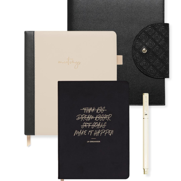 Executive Essentials Bundle - large Meeting Notebook, a matching large black compendium, an ivory rollerball pen, and the Day Organiser minimalist planner.